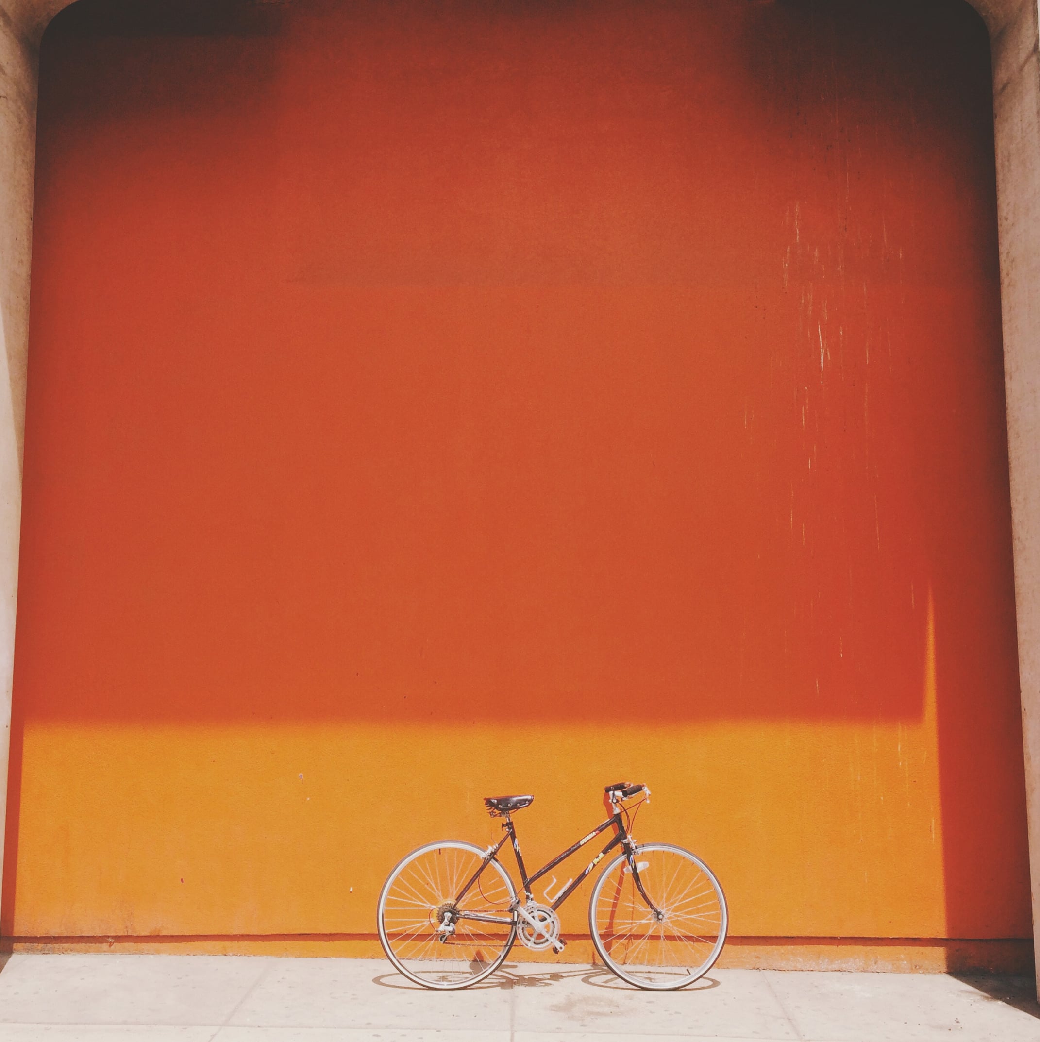 Bike in colorful wall.